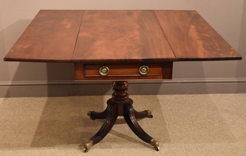 An elegant Regency Period Mahogany Pembroke Table with Flamed Timber