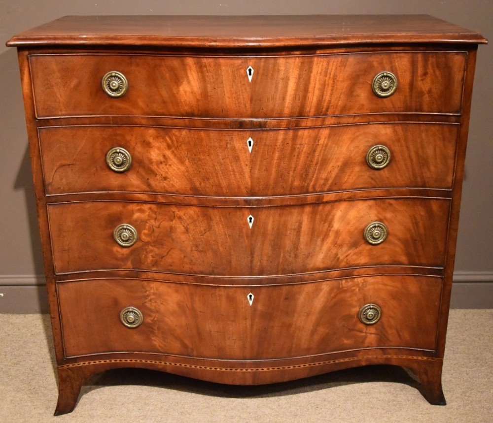 George III Serpentine Fronted Flame Mahogany Chest of Drawers