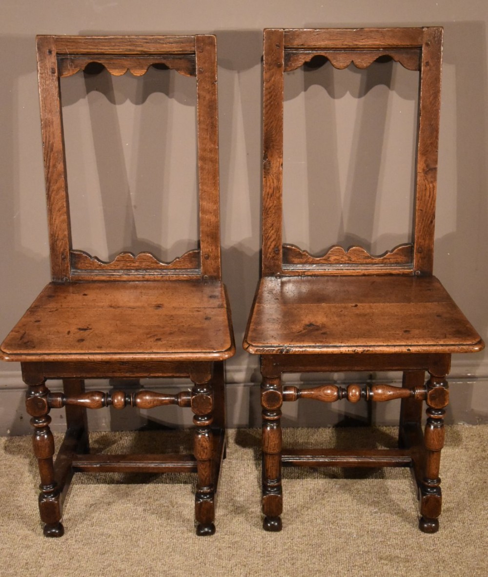 A Good Pair of Early 18th Century Oak and Fruitwood Back Stools