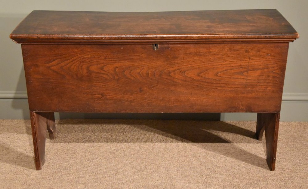A Delightful Small Elm Six Plank Coffer 
