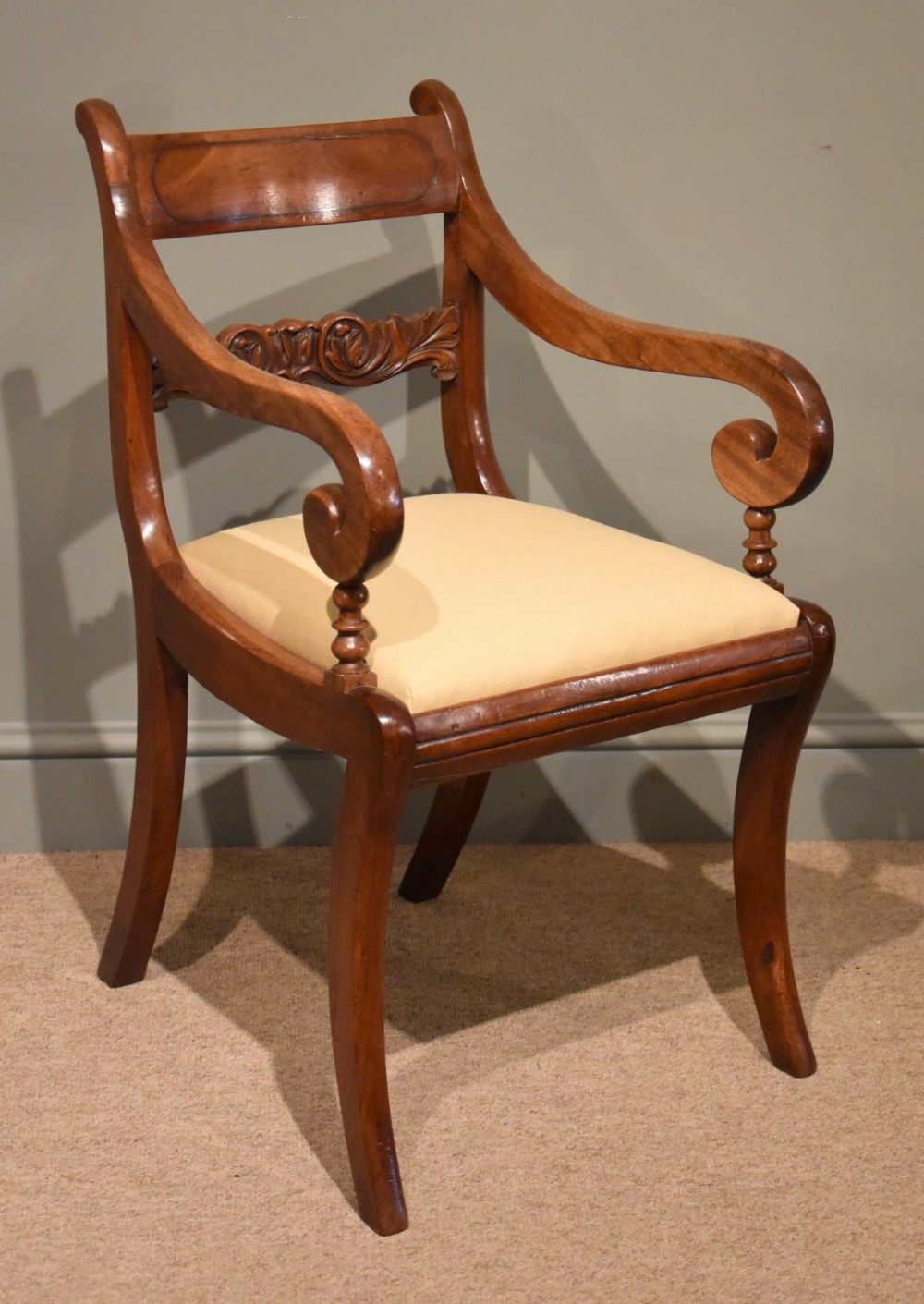 An Elegant Regency Mahogany Armchair With Brass Inlay