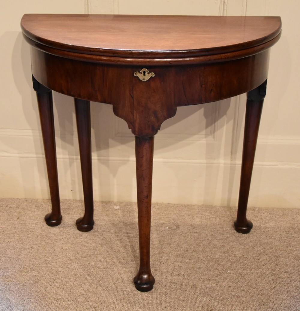 A Small George II Cuban Mahogany Demi Lune Tea Table 
