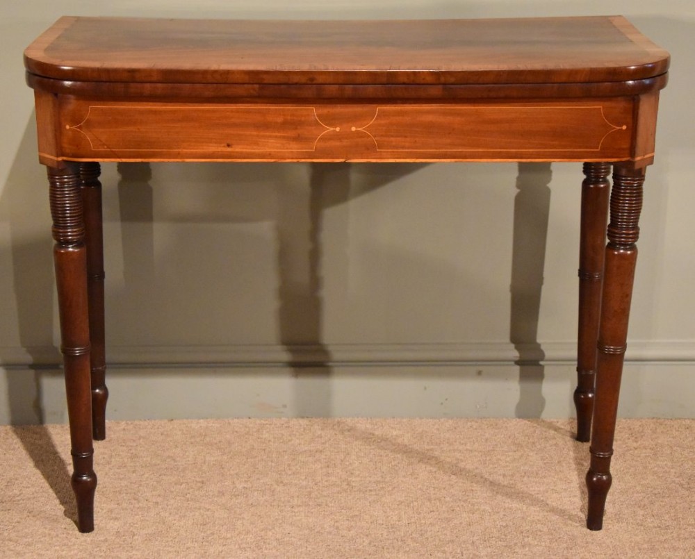 An Elegant Regency Mahogany Card Table