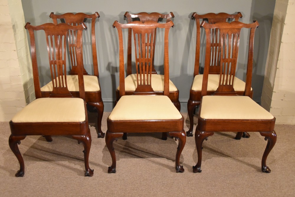 A Superb Set of Six George III Walnut Dining Chairs