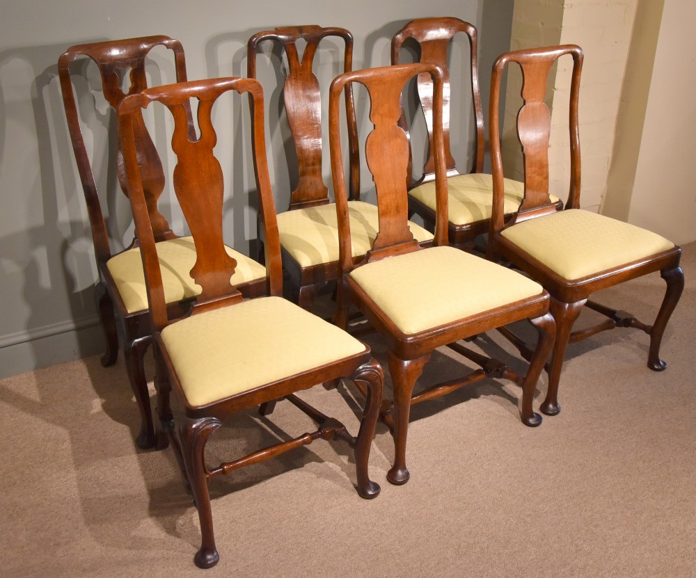 A Harlequin Set of 6 George II Walnut Dining Chairs