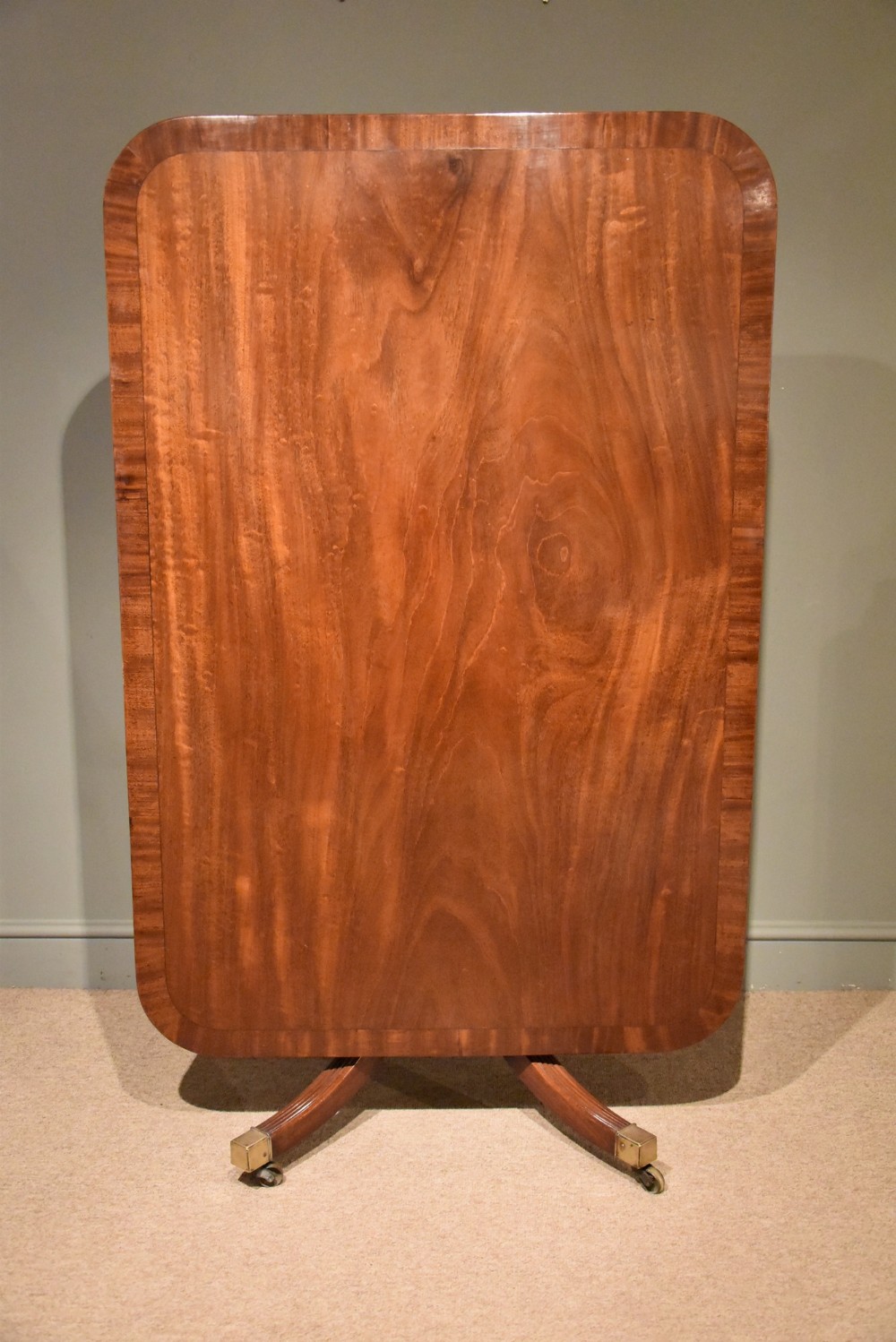 A Regency Breakfast Table with mahogany & Ebony Banding