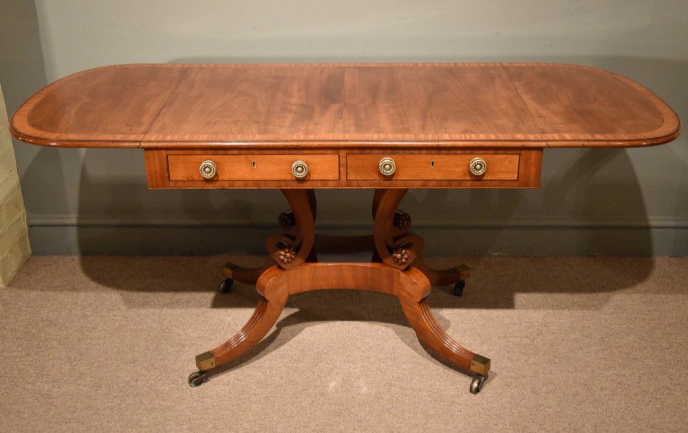 An Elegant Regency Period Cross Banded Sofa Table