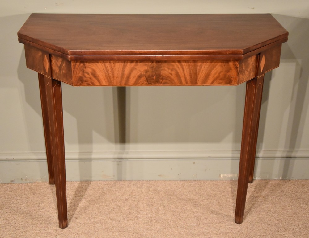 A George III Mahogany Fold Over Tea Table