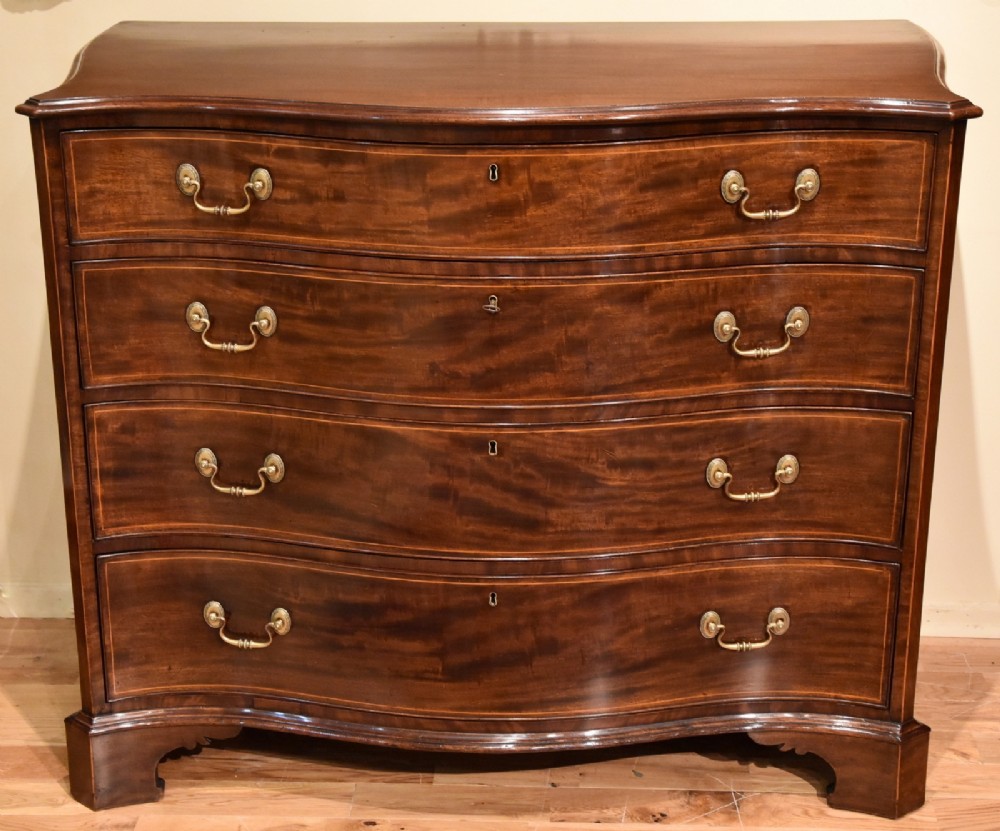 A Handsome 18th Century Mahogany and Boxwood Serpentine Chest of Drawers