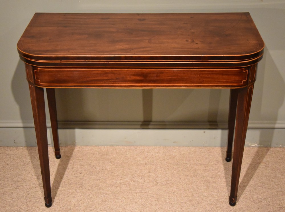 A George III Flame Mahogany Tea Table