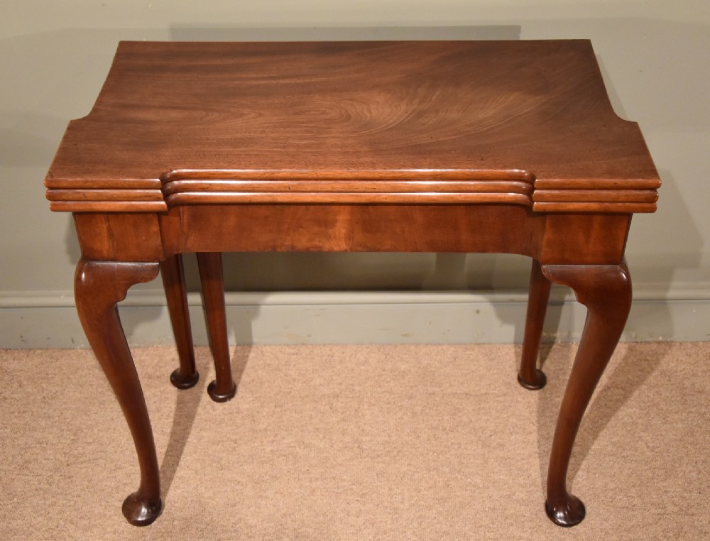 A Superb Early George III mahogany Triple Top Card Table