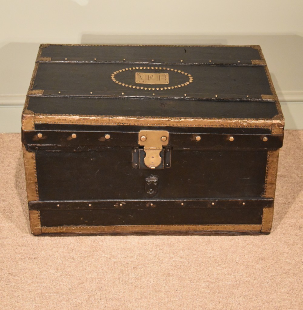 A Leather and Brass Bound Travelling Trunk 