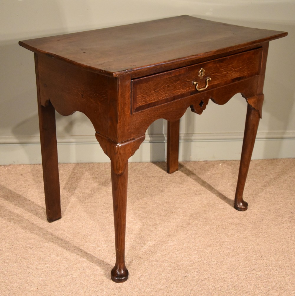 A Small George III Oak Lowboy