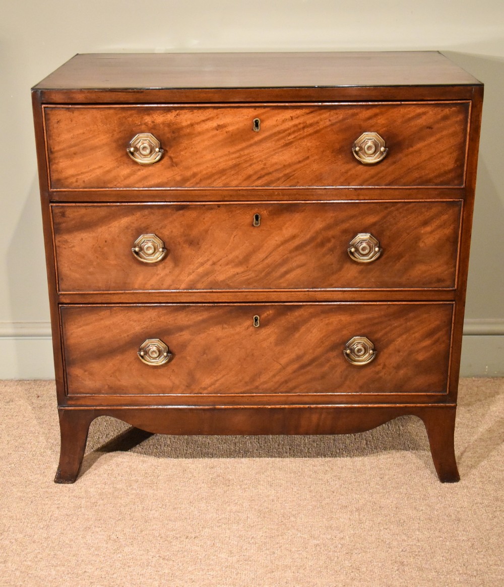 A Small Regency Period Mahogany Chest of Three Drawers