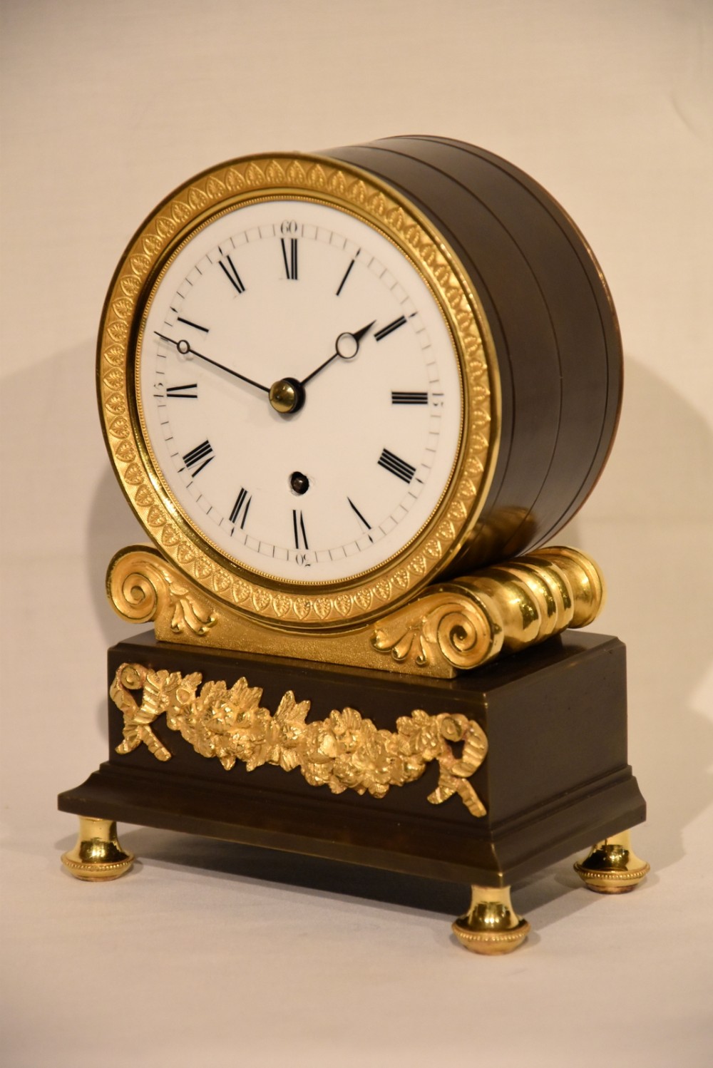 An English Regency Bronze and Ormolu Mantel Clock