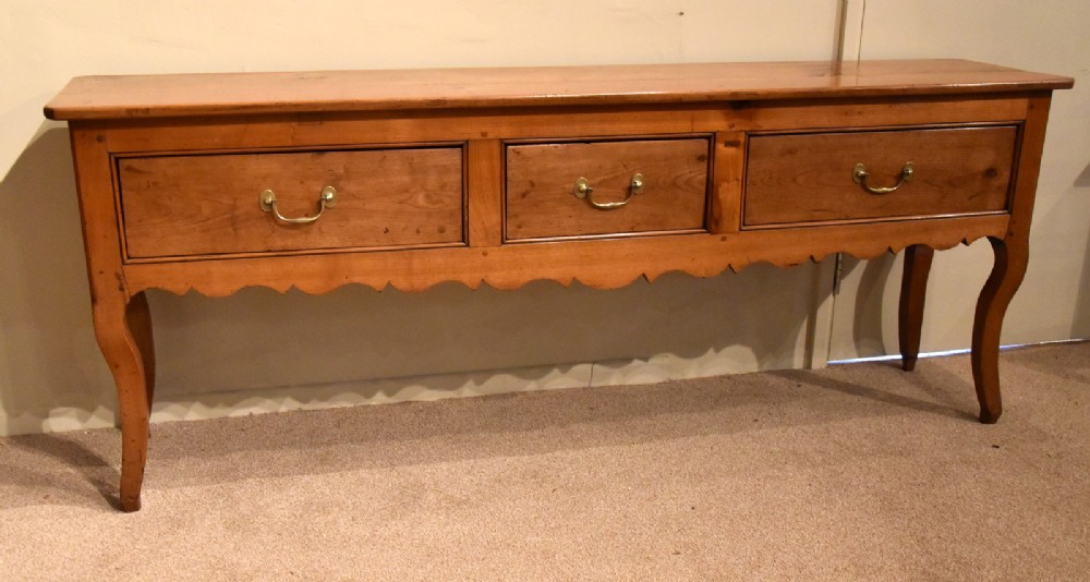 An Elegant 19th Century Cherry Wood Serving Table