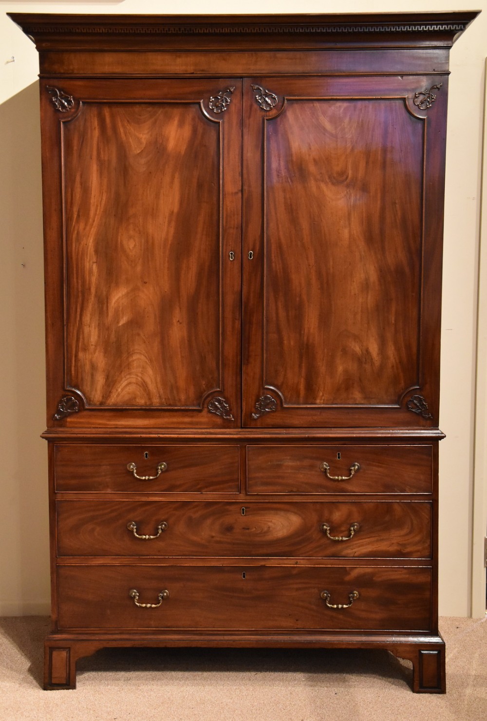 An Elegant George III Mahogany Linen Press