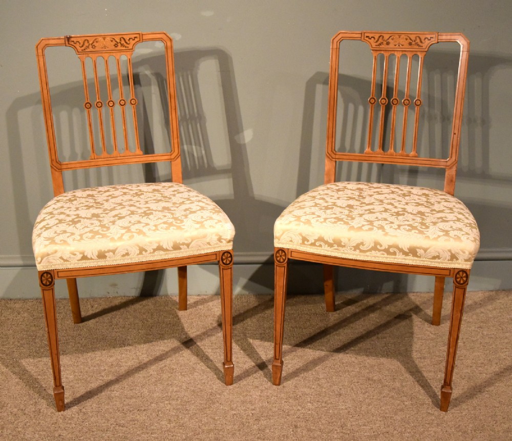 An Elegant Pair of Edwardian Satinwood Inlaid Side Chairs