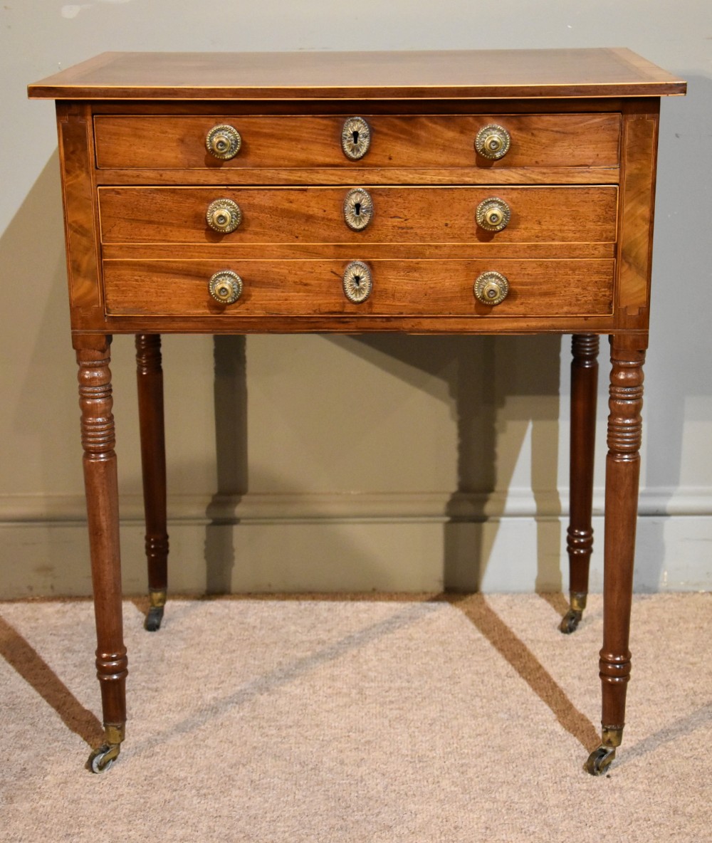 An Early 19th Century Mahogany and Inlaid Work Table