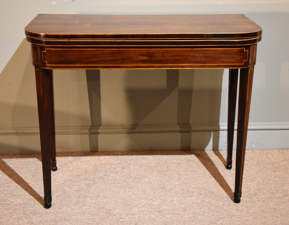 An Elegant George III Mahogany Tea Table