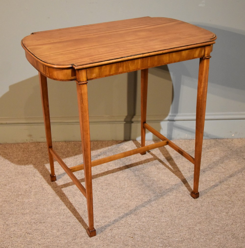 An Edwardian Satinwood Side or Centre Table