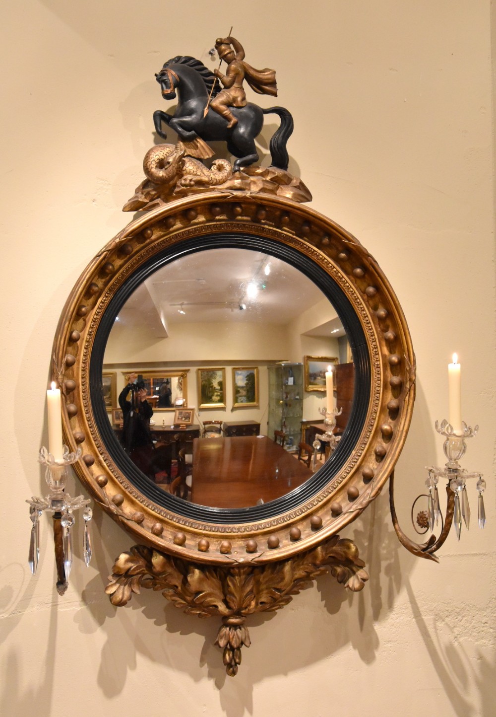 An Elegant Regency Giltwood Convex Mirror