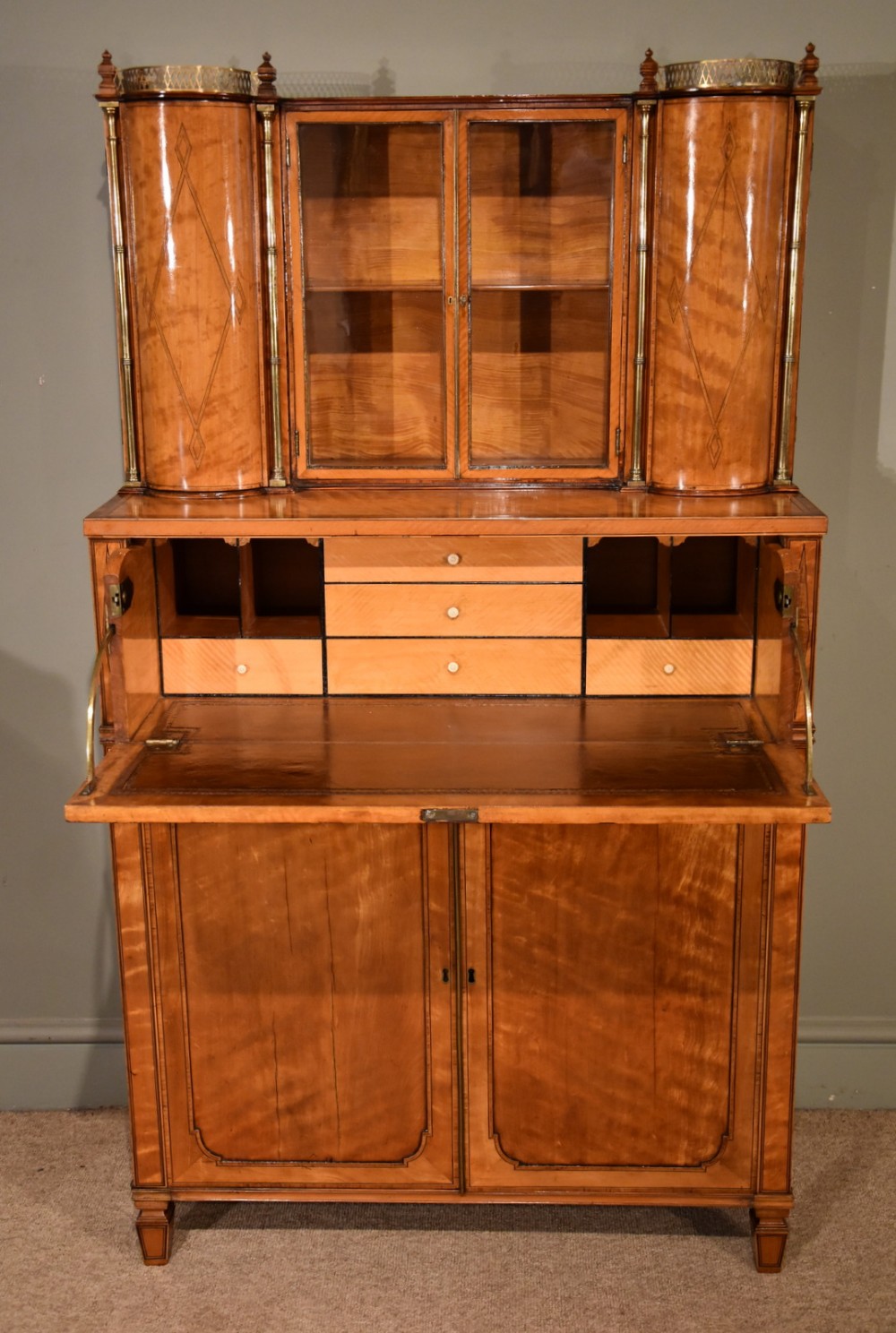 A Fine Regency Satinwood Secretaire Cabinet