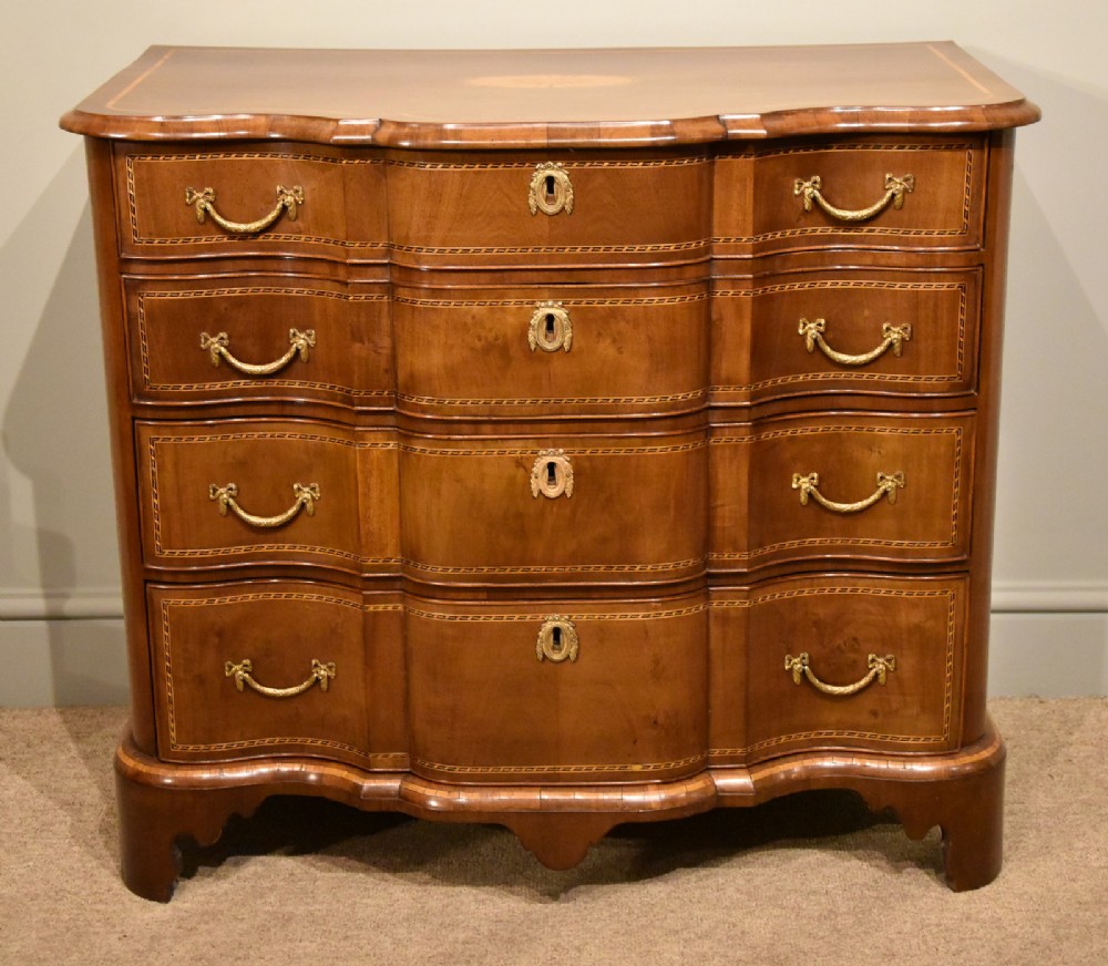 A Fine Dutch Mahogany Inlaid Breakfront Chest of Drawers 
