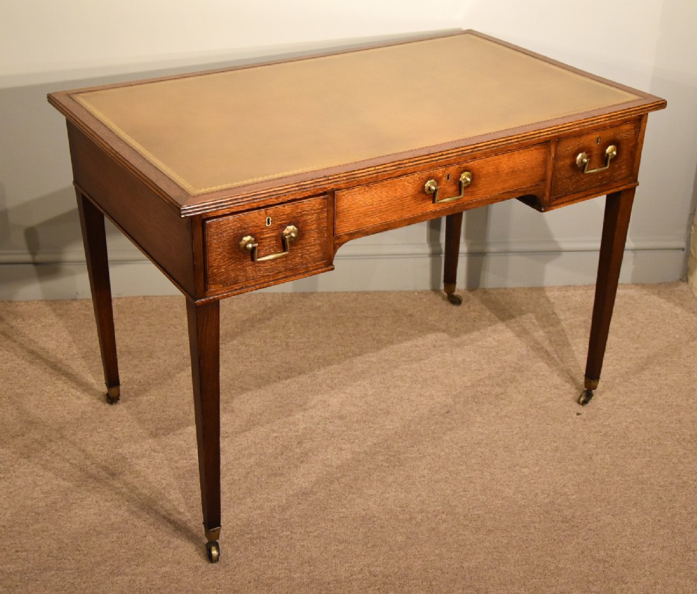 An Elegant 19th Century Oak Writing Table