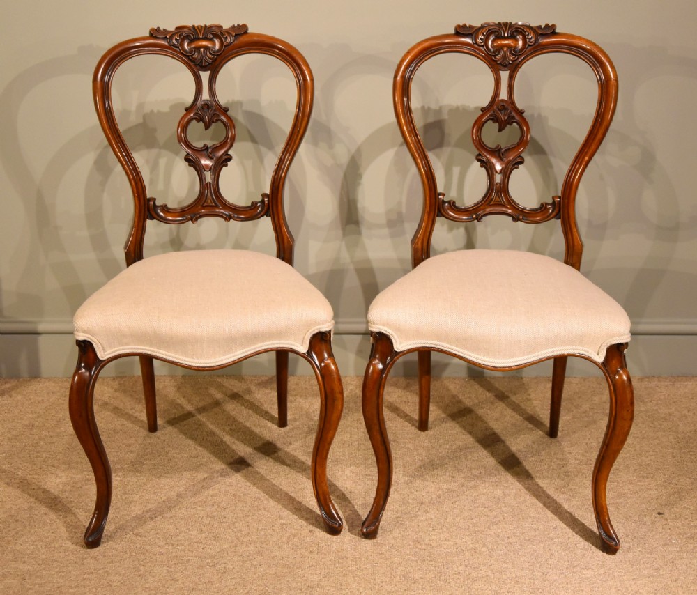 A Fine Quality Pair of Solid Walnut 19th Century Side Chairs