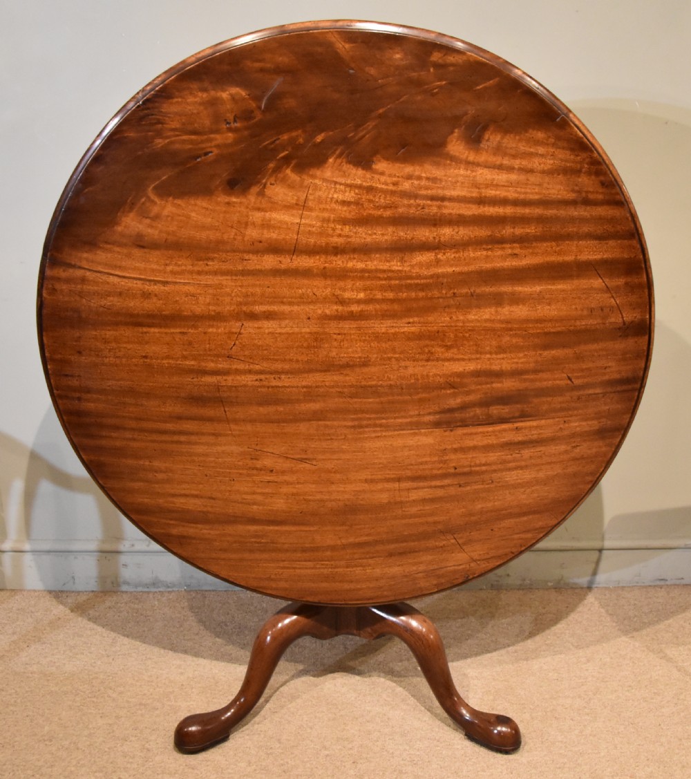 Large George III tilt-top mahogany centre table