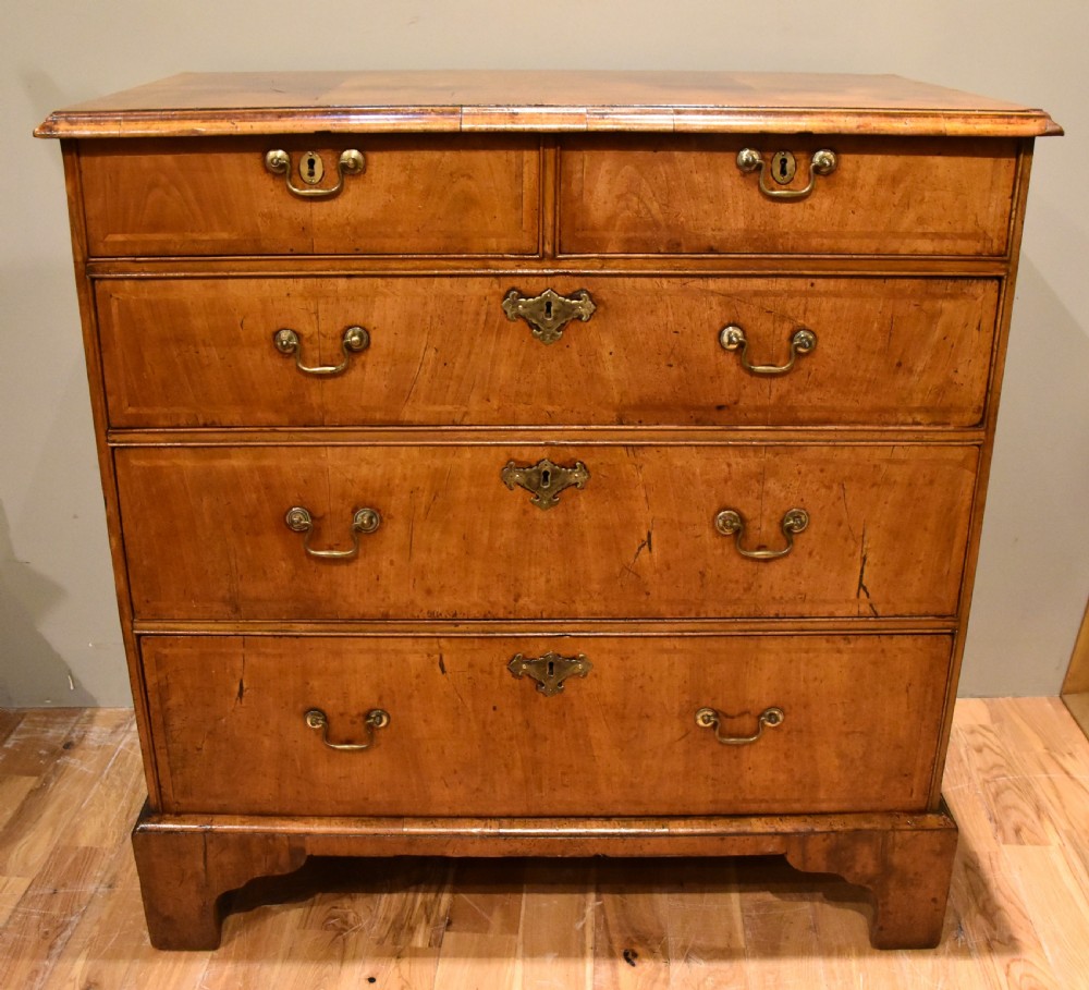 walnut veneered George I chest of drawers