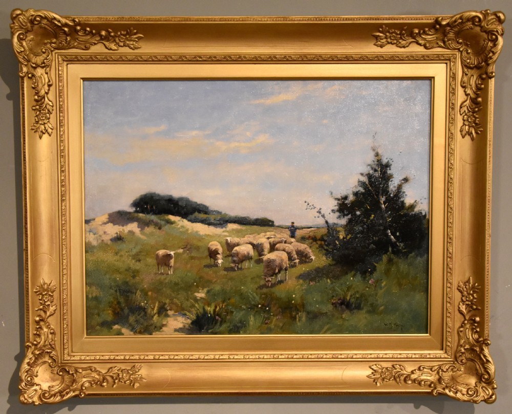 An oil painting on canvas depicting a flock of sheep grazing in an open landscape, framed in an ornate gilded wood frame.