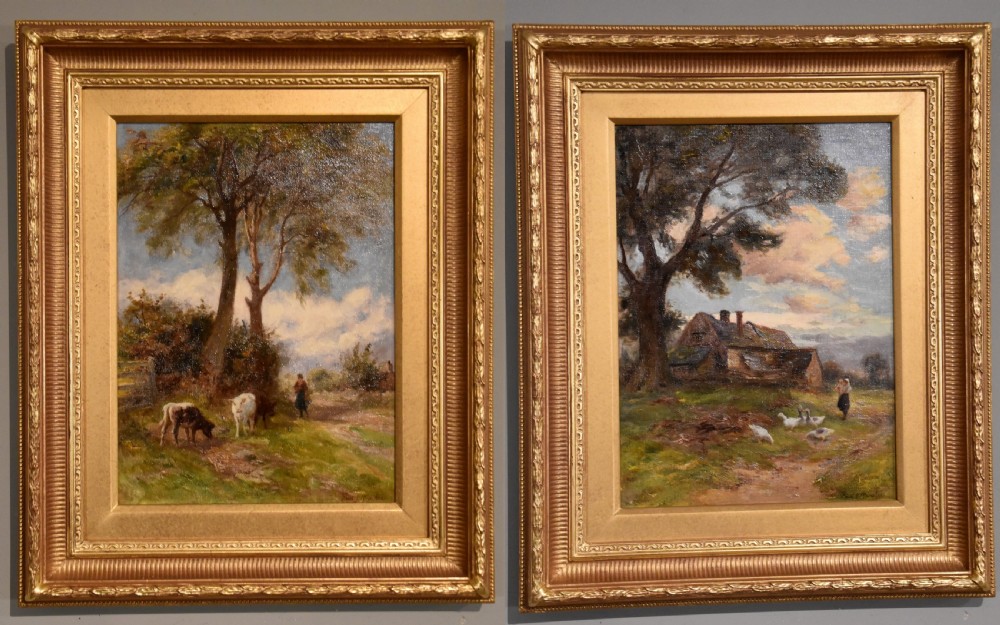 A pair of framed Victorian oil paintings depicting rural countryside scenes with livestock, figures, and farmhouses enclosed in ornate gilt frames.