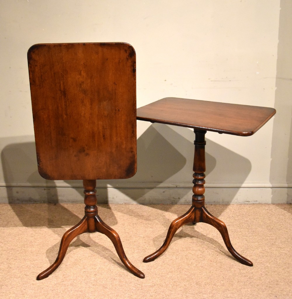 pair of George III mahogany tripod tables
