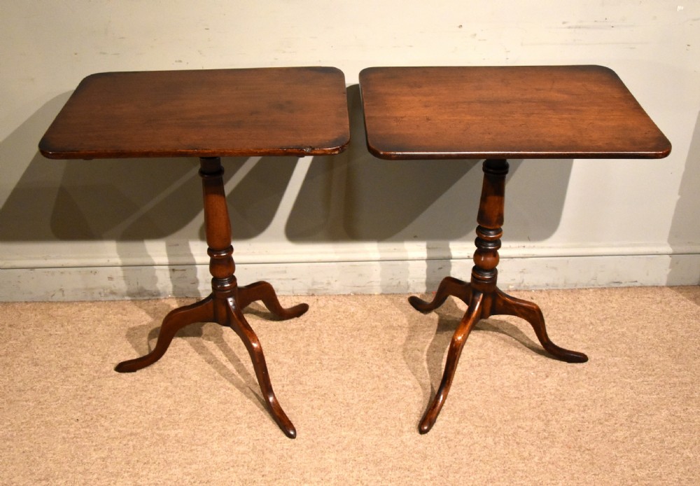pair of George III mahogany tripod tables View III