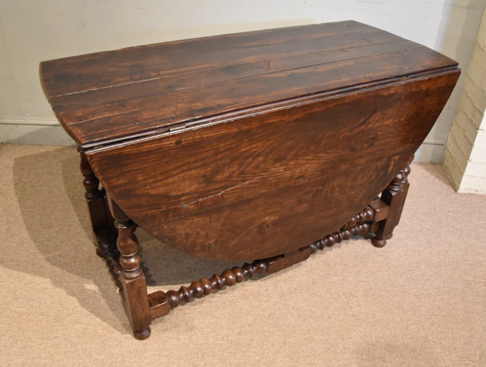 Large 17th century oak gate-leg table View II