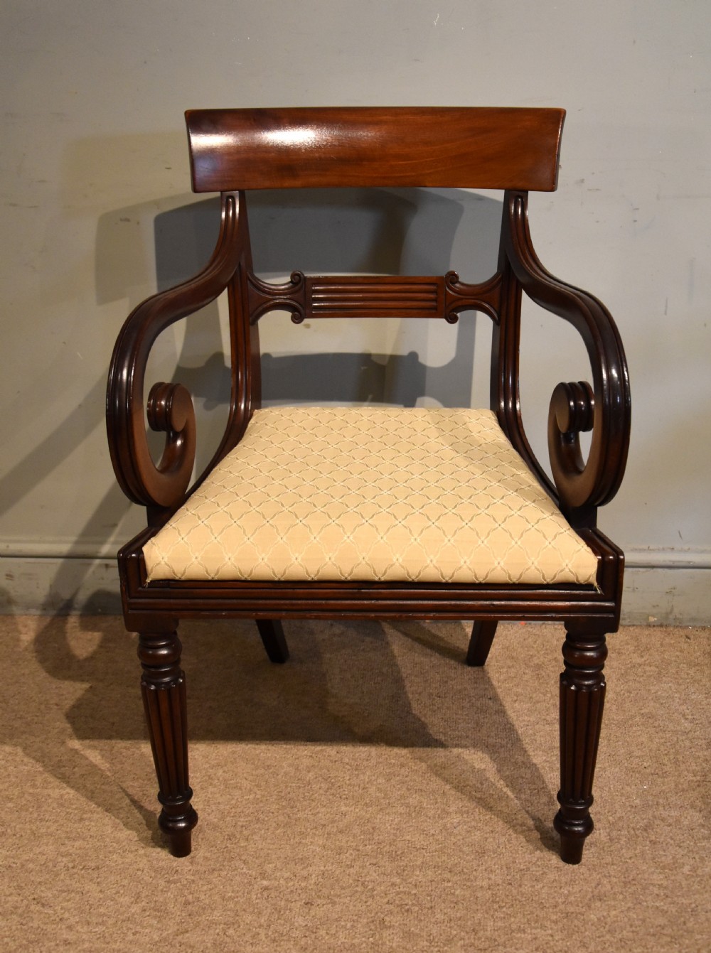 Regency period mahogany scroll armchair 