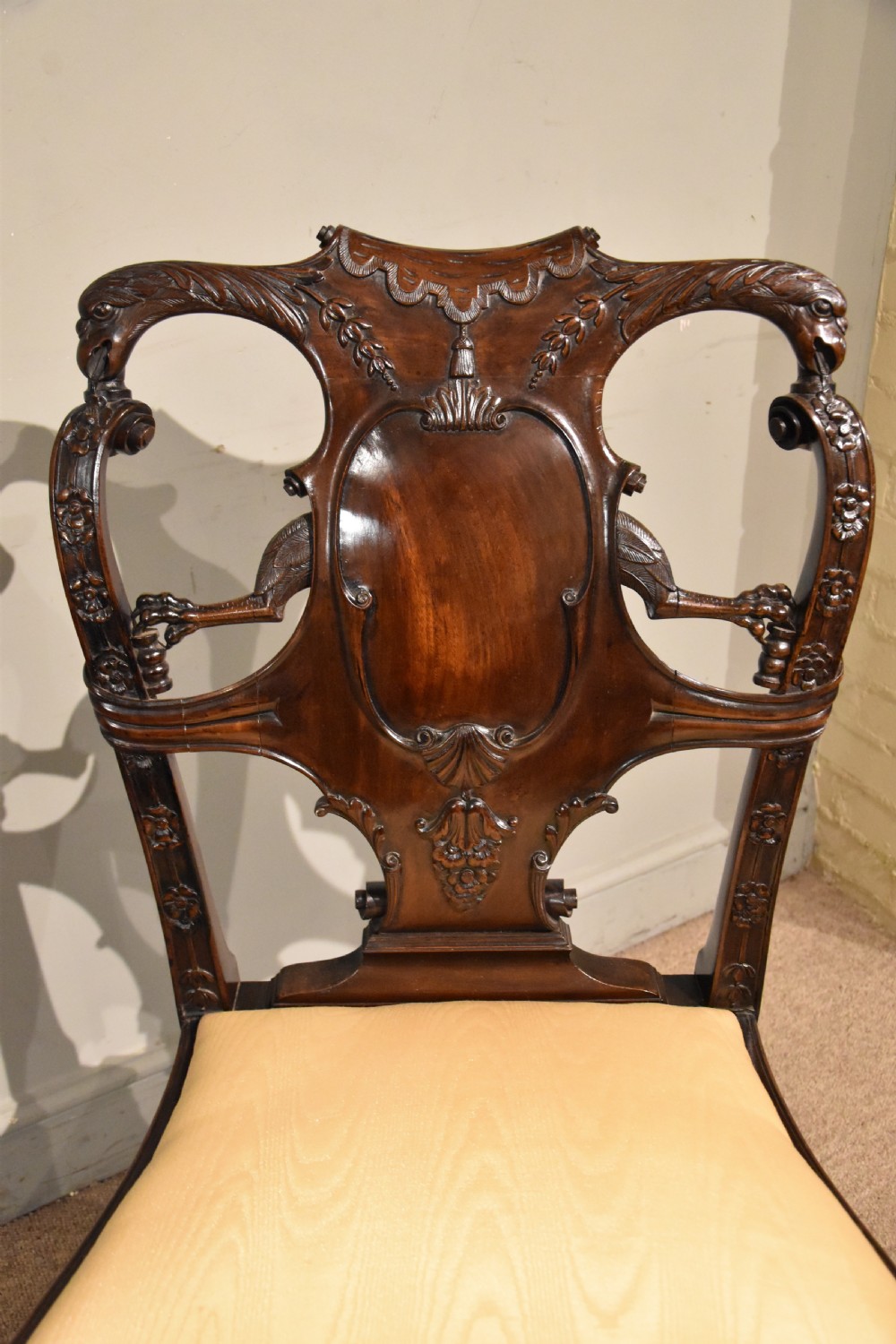 A 19th-century Cuban mahogany side chair featuring an openwork carved back, gold fabric seat, and cabriole legs with claw and ball feet. View III
