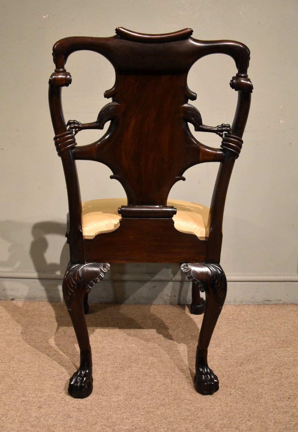 A 19th-century Cuban mahogany side chair featuring an openwork carved back, gold fabric seat, and cabriole legs with claw and ball feet. View IX