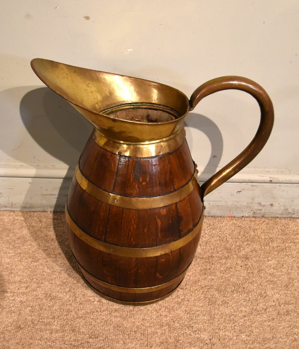 Large Victorian oak and brass bound pitcher jug View II