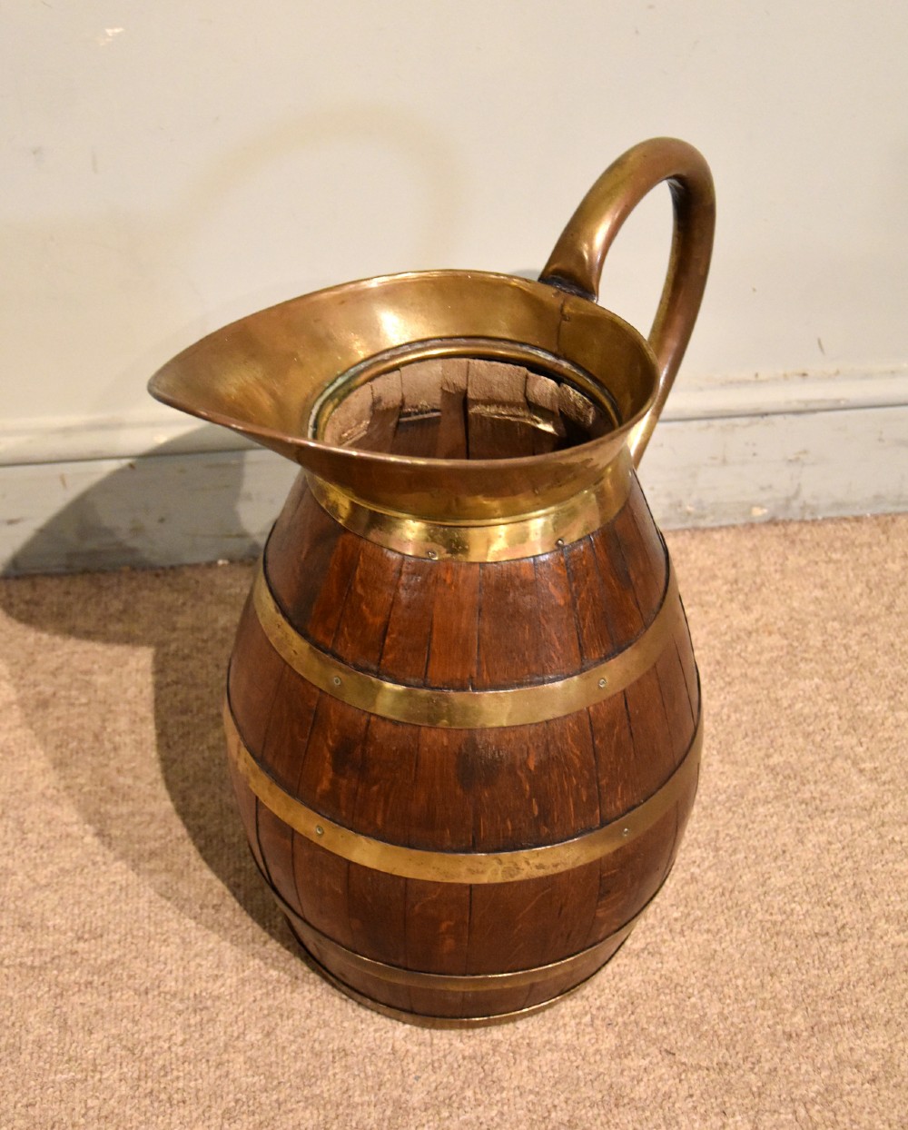 Large Victorian oak and brass bound pitcher jug View V