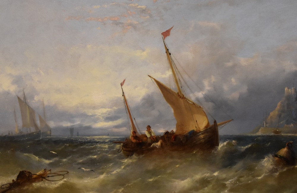 A Victorian oil painting depicting fishing boats on turbulent waters off St Michaels Mount set within an ornate gold gilt frame. View III