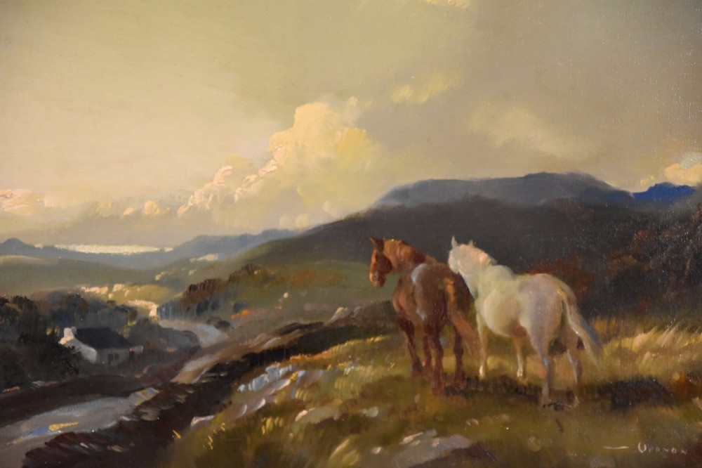 An oil painting depicting two horses on a grassy hill under a cloudy sky, displayed in an ornate carved giltwood frame. View III