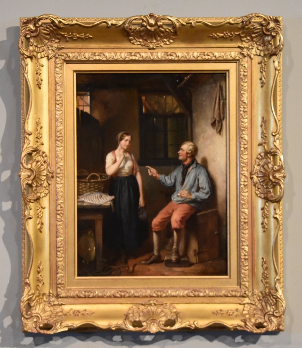 A framed oil painting depicting a woman standing beside a table and a seated man conversing inside a rustic Dutch cottage interior.