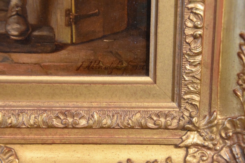 A framed oil painting depicting a woman standing beside a table and a seated man conversing inside a rustic Dutch cottage interior. View III