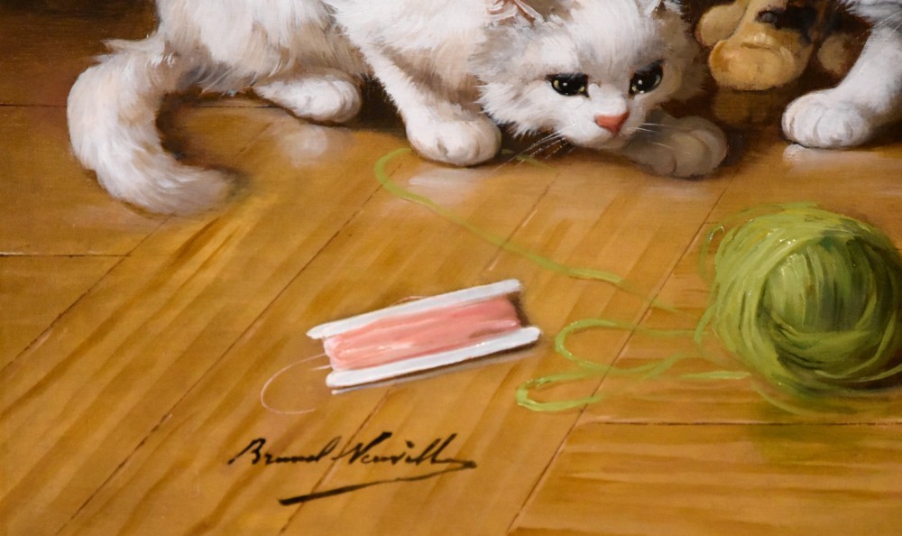 An antique oil painting depicting four kittens playing with yarn on a wooden floor, enclosed in a gilded frame. View IV