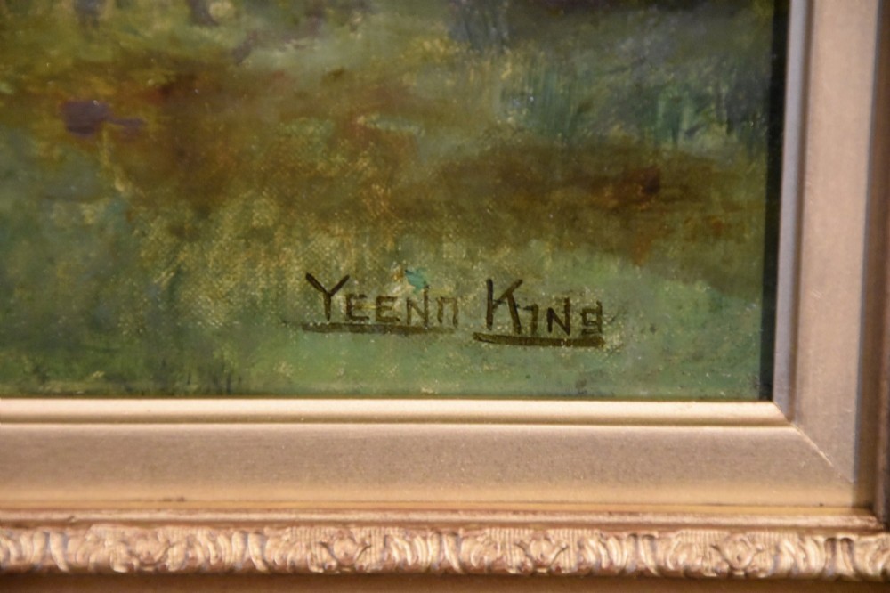 An antique oil painting depicting a woodland landscape with purple flowers beneath a tree, displayed within an ornate gilt frame. View IV