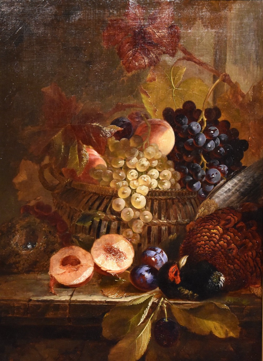 A 19th-century Victorian still life oil painting depicting grapes, peaches, plums, and game birds set within a gilded frame. View II