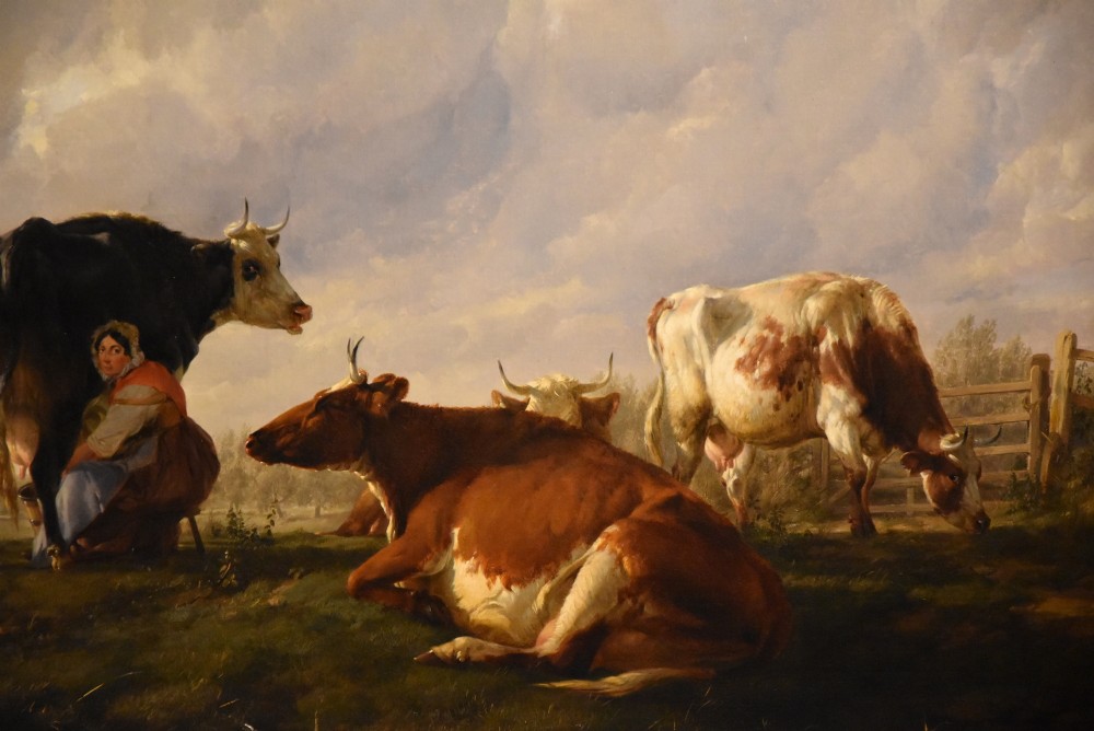 A 19th-century Victorian pastoral oil painting featuring cattle and a milkmaid near a river in an intricate gilded frame. View IV
